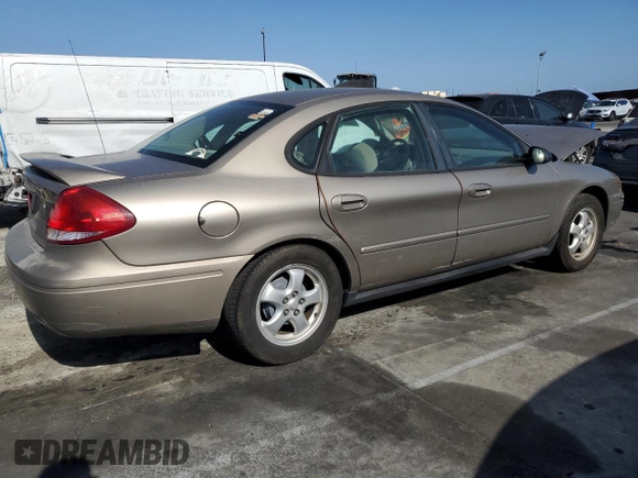 2005 Ford Taurus SE z VIN 1FAFP53215A212736, wystawiony jako Copart lot #58439495 z przebiegiem Nie podano mil oraz Szkoda całkowita • Salvage title. Historia ofert i sprzedaży dostępna na DreamBid. Obrazek 3.