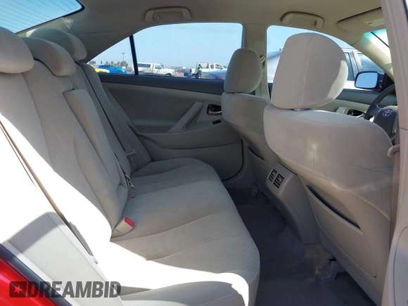 2007 Toyota Camry z VIN JTNBB46K673009891, wystawiony jako IAAI lot #42161828 z przebiegiem 220 292 mil mil oraz . Historia ofert i sprzedaży dostępna na DreamBid. Obrazek 8.