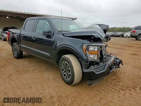 2023 Ford F-150 XL with VIN 1FTEW1EP5PKF67674, listed as a Copart auction lot 50348795 with 23,176 mi miles and Salvage title. Bid and sale history available at DreamBid. Image 10.