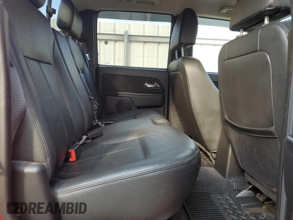 2011 GMC Canyon SLT with VIN 1GTH6NFE5B8130457, listed as a Copart auction lot 72559914 with 0 mi miles and Salvage Title. Bid and sale history available at carsss.com. Image 11.