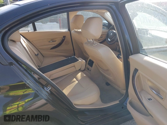 2014 BMW 3 Series 328i xDrive with VIN WBA3B5G56ENS06890, listed as a IAAI auction lot 42168982 with 133,664 mi miles. Bid and sale history available at carsss.com. Image 8.