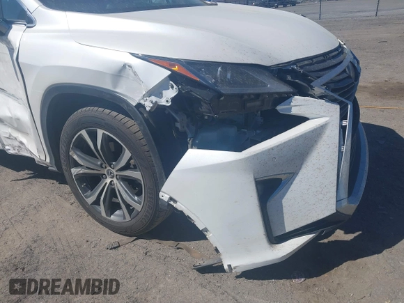 2018 Lexus RX 350 z VIN 2T2BZMCAXJC144930, wystawiony jako IAAI lot #41857778 z przebiegiem 108 191 mil mil oraz . Historia ofert i sprzedaży dostępna na DreamBid. Obrazek 17.