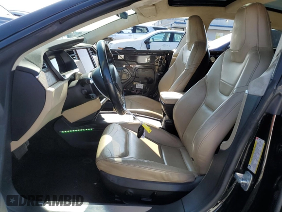 2016 Tesla Model S 90D with VIN 5YJSA1E20GF169954, listed as a Copart auction lot 61974475 with 124,560 mi miles and Salvage title. Bid and sale history available at DreamBid. Image 7.