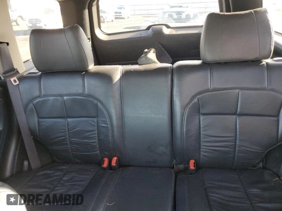 2003 Jeep Grand Cherokee Limited z VIN 1J8GW58N73C502929, wystawiony jako Copart lot #79472734 z przebiegiem 231 176 mil mil oraz Szkoda całkowita • Salvage title. Historia ofert i sprzedaży dostępna na DreamBid. Obrazek 10.