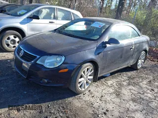 2008 Volkswagen Eos Turbo z VIN WVWBA71F68V050997, wystawiony jako IAAI lot #41858344 z przebiegiem 144 102 mil mil oraz . Historia ofert i sprzedaży dostępna na DreamBid. Obrazek 2.