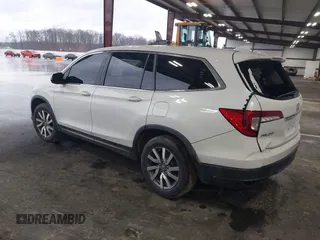 2021 Honda Pilot EX-L with VIN 5FNYF5H57MB022843, listed as a IAAI auction lot 41186957 with 57,836 mi miles. Bid and sale history available at carsss.com. Image 3.
