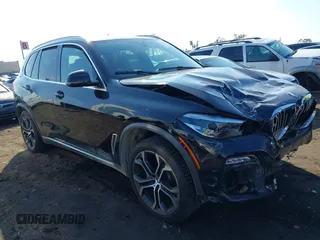 2020 BMW X5 sDrive40i with VIN 5UXCR4C00L9B41013, listed as a IAAI auction lot 41458739 with Not Provided miles and . Bid and sale history available at DreamBid. Image 1.