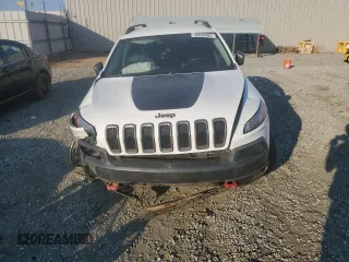 2015 Jeep Cherokee Trailhawk z VIN 1C4PJMBSXFW642149, wystawiony jako Copart lot #46656565 z przebiegiem 100 496 mil mil oraz Szkoda całkowita • Salvage title. Historia ofert i sprzedaży dostępna na DreamBid. Obrazek 5.