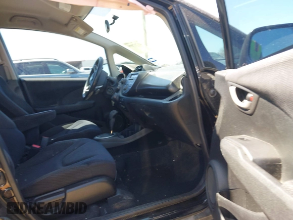 2013 Honda Fit Sport with VIN JHMGE8H57DC049293, listed as a IAAI auction lot 41757899 with 113,963 mi miles. Bid and sale history available at carsss.com. Image 5.