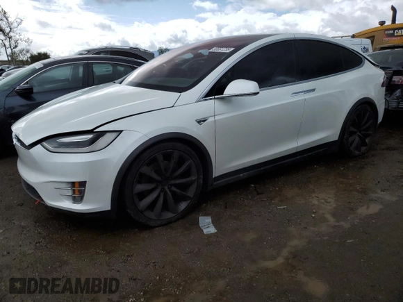 2016 Tesla Model X 70D with VIN 5YJXCAE28GF017100, listed as a Copart auction lot 50081235 with 126,962 mi miles and Salvage Title. Bid and sale history available at DreamBid. Image 1.