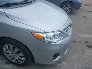 2013 Toyota Corolla L with VIN 2T1BU4EEXDC052854, listed as a IAAI auction lot 42230118 with 156,120 mi miles and . Bid and sale history available at DreamBid. Image 20.