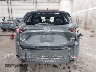 2020 Mazda CX-5 Touring with VIN JM3KFBCM0L0843242, listed as a IAAI auction lot 41536075 with 31,849 mi miles. Bid and sale history available at carsss.com. Image 16.