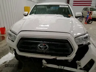 2023 Toyota Tacoma 4WD SR with VIN 3TYCZ5AN3PT144650, listed as a Copart auction lot 43936675 with 11,267 mi miles and Salvage Title. Bid and sale history available at carsss.com. Image 11.