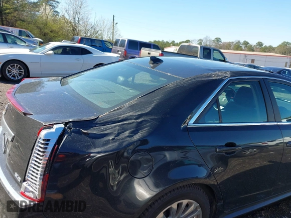 2012 Cadillac CTS Premium with VIN 1G6DP5E3XC0131943, listed as a IAAI auction lot 41747969 with 70,859 mi miles and . Bid and sale history available at DreamBid. Image 6.
