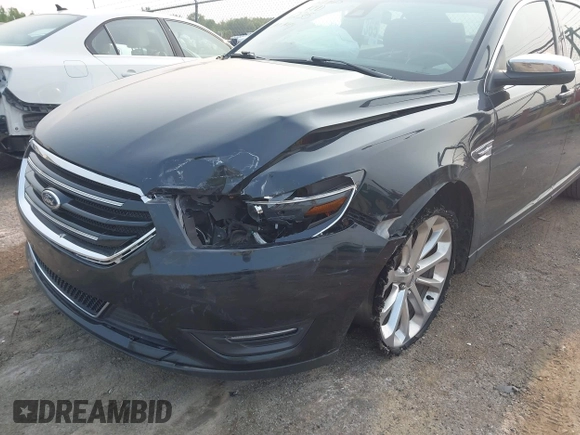 2014 Ford Taurus Limited with VIN 1FAHP2F88EG171235, listed as a IAAI auction lot 42402720 with 79,951 mi miles and . Bid and sale history available at DreamBid. Image 6.