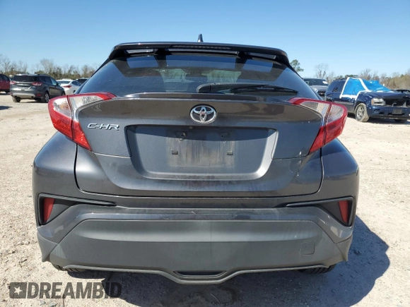 2019 Toyota C-HR XLE with VIN JTNKHMBX8K1051600, listed as a Copart auction lot 47449615 with 82,309 mi miles and Salvage Title. Bid and sale history available at DreamBid. Image 6.