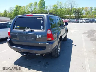 2006 Toyota 4Runner SR5 with VIN JTEBU14R668060785, listed as a IAAI auction lot 42072120 with 232,129 mi miles. Bid and sale history available at carsss.com. Image 4.
