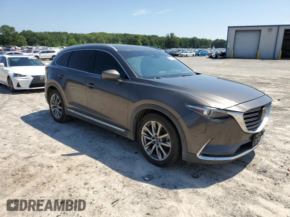 2018 Mazda CX-9 Grand Touring with VIN JM3TCADY1J0212568, listed as a Copart auction lot 60195385 with 151,099 mi miles and Salvage title. Bid and sale history available at DreamBid. Image 4.