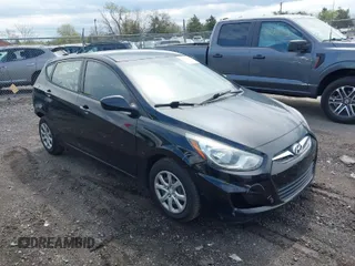 2014 Hyundai Accent GS with VIN KMHCT5AE3EU193249, listed as a IAAI auction lot 41973614 with 136,655 mi miles. Bid and sale history available at carsss.com. Image 1.