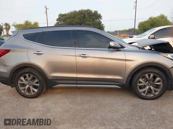 2018 Hyundai Santa Fe Ultimate with VIN 5NMZWDLAXJH100108, listed as a IAAI auction lot 42126768 with 68,325 mi miles and . Bid and sale history available at DreamBid. Image 13.