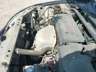 2002 Toyota Camry LE z VIN 4T1BE32K72U098901, wystawiony jako IAAI lot #42490653 z przebiegiem 120 619 mil mil oraz . Historia ofert i sprzedaży dostępna na DreamBid. Obrazek 13.