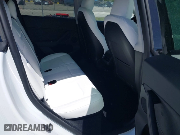 2025 Tesla Model Y Long Range with VIN 7SAYGDED6SF234278, listed as a IAAI auction lot 41781695 with 1,168 mi miles and . Bid and sale history available at DreamBid. Image 8.