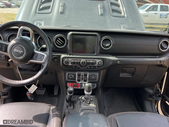 2020 Jeep Gladiator Rubicon with VIN 1C6JJTBG3LL117899, listed as a Copart auction lot 54328235 with 52,674 mi miles and Non Repairable. Bid and sale history available at carsss.com. Image 9.