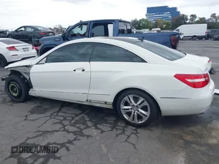 2010 Mercedes-Benz E with VIN WDDKJ5GB0AF005357, listed as a IAAI auction lot 42020474 with 133,117 mi miles. Bid and sale history available at carsss.com. Image 15.