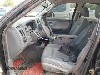 2005 Dodge Dakota Laramie with VIN 1D7HW58N65S161629, listed as a Copart auction lot 66570164 with 205,984 mi miles and Salvage Title. Bid and sale history available at carsss.com. Image 7.