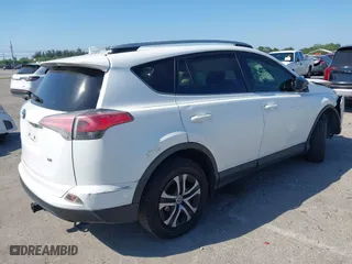 2017 Toyota RAV4 LE with VIN JTMZFREV7HJ143483, listed as a IAAI auction lot 41804683 with 129,319 mi miles. Bid and sale history available at carsss.com. Image 4.