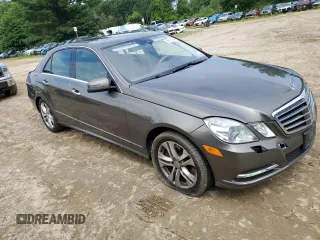 2011 Mercedes-Benz E-Class E 550 Luxury with VIN WDDHF9AB1BA385318, listed as a Copart auction lot 66115634 with 197,595 mi miles and Salvage Title. Bid and sale history available at carsss.com. Image 4.