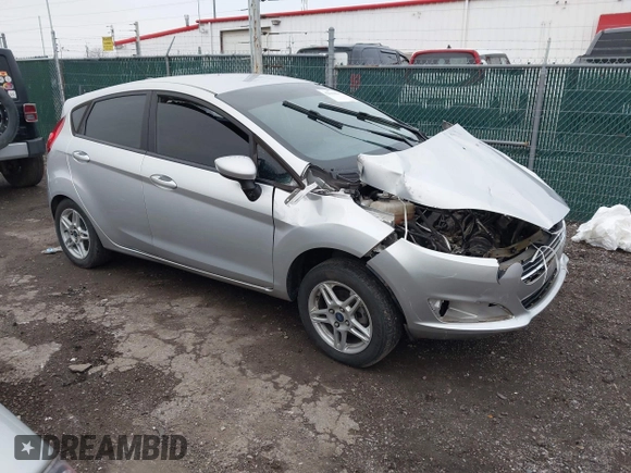 2017 Ford Fiesta SE with VIN 3FADP4EJ5HM104763, listed as a IAAI auction lot 42009697 with 117,980 mi miles. Bid and sale history available at carsss.com. Image 1.