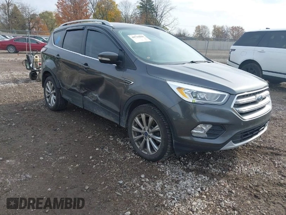 2017 Ford Escape Titanium with VIN 1FMCU9J98HUA49434, listed as a IAAI auction lot 40710866 with 143,850 mi miles. Bid and sale history available at carsss.com. Image 1.