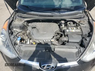 2013 Hyundai Veloster w/Gray Int z VIN KMHTC6ADXDU092253, wystawiony jako Copart lot #57708055 z przebiegiem 141 904 mil mil oraz Tytuł czysty. Historia ofert i sprzedaży dostępna na DreamBid. Obrazek 11.