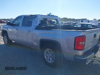2017 GMC Sierra 1500 SLE with VIN 3GTU2MEC3HG199980, listed as a IAAI auction lot 40534708 with 129,765 mi miles and . Bid and sale history available at DreamBid. Image 3.