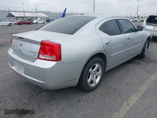 2010 Dodge Charger SXT with VIN 2B3CA3CVXAH307483, listed as a IAAI auction lot 42005739 with 165,844 mi miles. Bid and sale history available at carsss.com. Image 4.