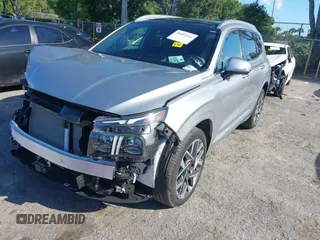 2023 Hyundai Santa Fe Calligraphy with VIN 5NMS54AL2PH560512, listed as a IAAI auction lot 39492126 with 6,379 mi miles and . Bid and sale history available at DreamBid. Image 2.