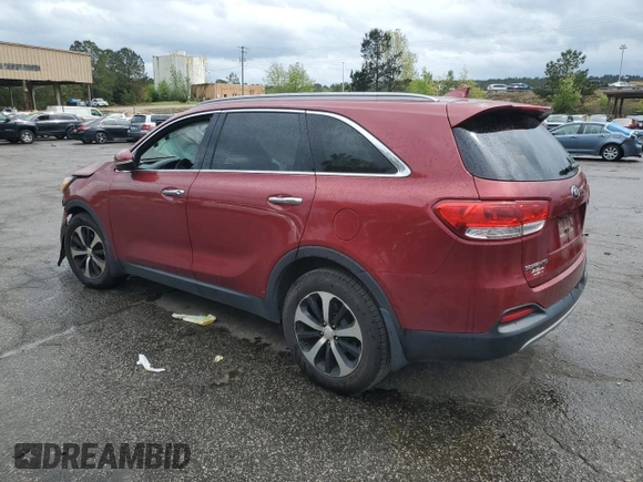 2016 Kia Sorento EX with VIN 5XYPH4A17GG028369, listed as a Copart auction lot 52107365 with 216,039 mi miles and Salvage title. Bid and sale history available at DreamBid. Image 2.