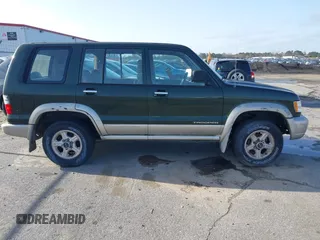 2000 Isuzu Trooper S z VIN JACDS58X9Y7J08094, wystawiony jako IAAI lot #41818546 z przebiegiem 154 927 mil mil oraz . Historia ofert i sprzedaży dostępna na DreamBid. Obrazek 13.