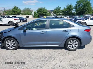 2021 Toyota Corolla LE with VIN JTDEPMAE7MJ144664, listed as a IAAI auction lot 42269698 with 23,500 mi miles and . Bid and sale history available at DreamBid. Image 15.