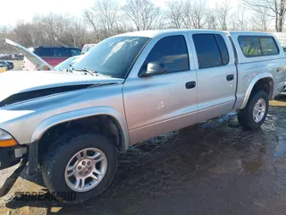 2004 Dodge Dakota Sport with VIN 1D7HG38K44S591424, listed as a IAAI auction lot 41645873 with 135,396 mi miles. Bid and sale history available at carsss.com. Image 14.