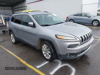 2014 Jeep Cherokee Limited z VIN 1C4PJLDB2EW293347, wystawiony jako IAAI lot #42678118 z przebiegiem 216 407 mil mil oraz . Historia ofert i sprzedaży dostępna na DreamBid. Obrazek 1.