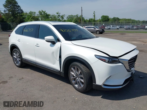 2021 Mazda CX-9 Grand Touring z VIN JM3TCBDY8M0537986, wystawiony jako IAAI lot #42267157 z przebiegiem 25 375 mil mil oraz . Historia ofert i sprzedaży dostępna na DreamBid. Obrazek 1.