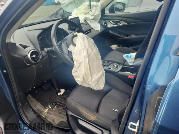2019 Mazda CX-3 Touring z VIN JM1DKFC78K0414606, wystawiony jako Copart lot #56095515 z przebiegiem Nie podano mil oraz Szkoda całkowita • Salvage title. Historia ofert i sprzedaży dostępna na DreamBid. Obrazek 7.