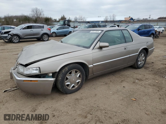2000 Cadillac Eldorado with VIN 1G6EL12Y5YU166723, listed as a Copart auction lot 82612034 with 80,839 mi miles and Salvage title. Bid and sale history available at DreamBid. Image 1.