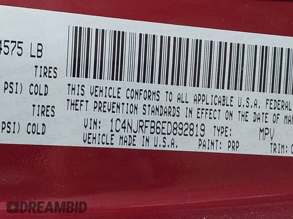 2014 Jeep Patriot Latitude with VIN 1C4NJRFB6ED892819, listed as a IAAI auction lot 42053389 with 92,213 mi miles and . Bid and sale history available at carsss.com. Image 9.