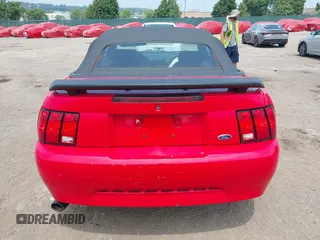 2003 Ford Mustang Deluxe z VIN 1FAFP44433F452977, wystawiony jako IAAI lot #42598309 z przebiegiem 99 596 mil mil oraz . Historia ofert i sprzedaży dostępna na DreamBid. Obrazek 16.