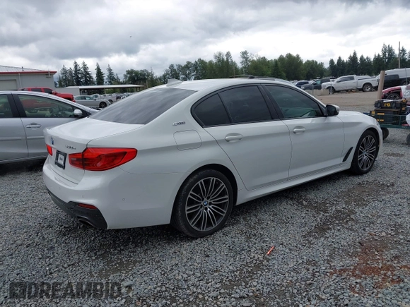 2019 BMW 5 Series 530e with VIN WBAJA9C57KB389401, listed as a IAAI auction lot 42565098 with 52,343 mi miles and . Bid and sale history available at DreamBid. Image 4.
