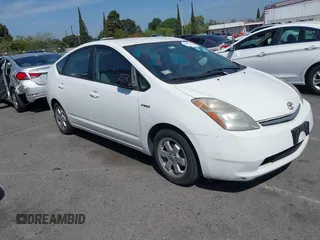 2006 Toyota Prius with VIN JTDKB20UX67527206, listed as a IAAI auction lot 42093925 with 124,256 mi miles. Bid and sale history available at carsss.com. Image 1.