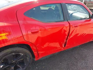 2009 Dodge Charger SXT with VIN 2B3KA33V49H639426, listed as a IAAI auction lot 42041134 with 155,410 mi miles and . Bid and sale history available at carsss.com. Image 6.